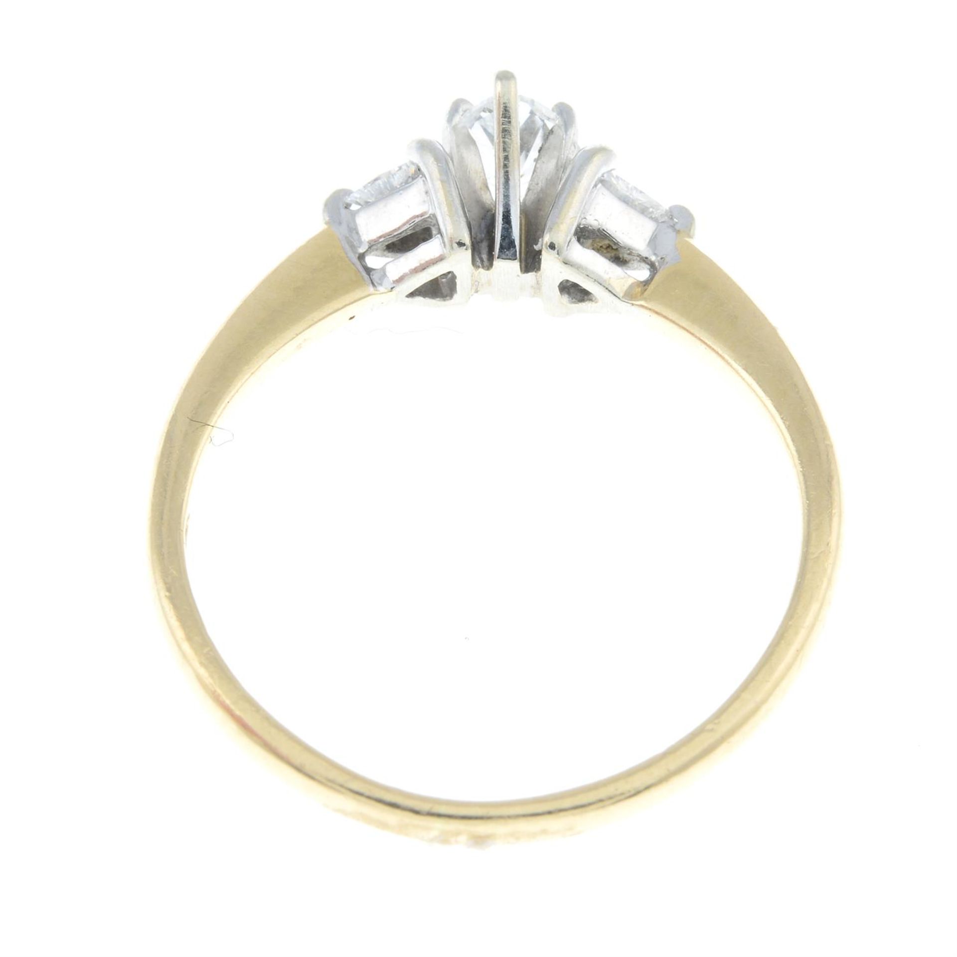 A marquise-shape and triangular-shape diamond three-stone ring. - Image 2 of 2