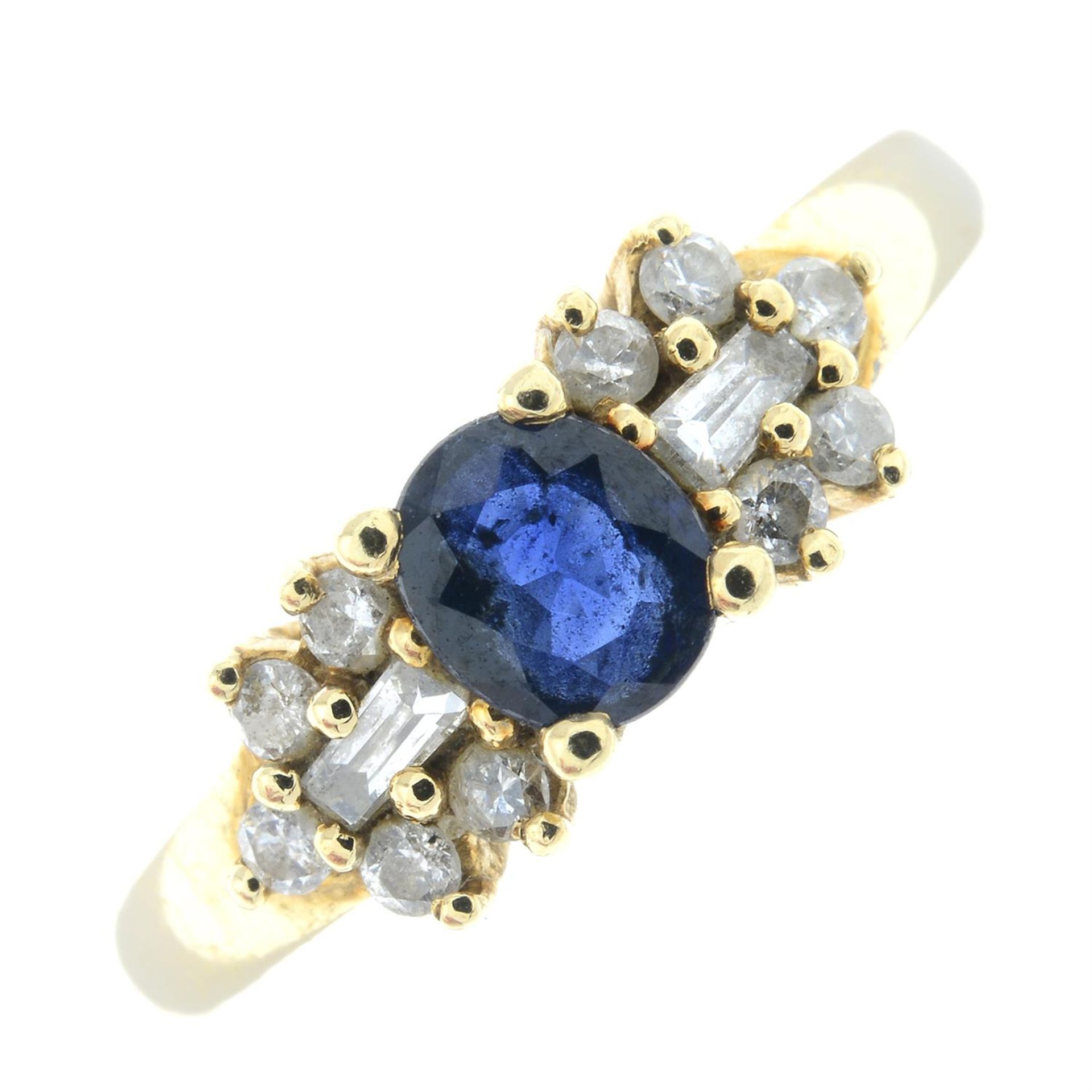 A sapphire and vari-cut diamond ring.