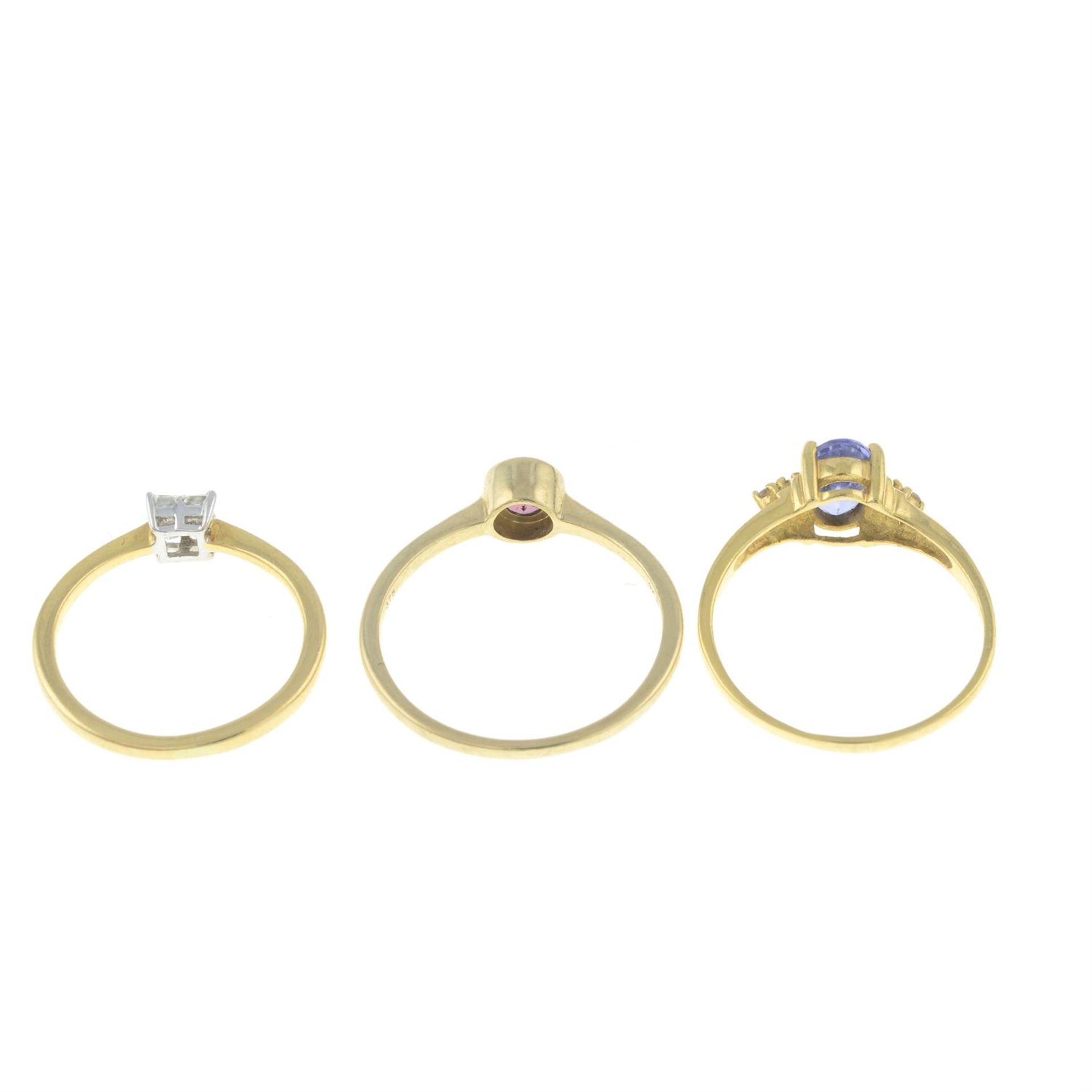 An 18ct gold diamond cluster ring, an 18ct gold tanzanite ring and a 9ct gold garnet ring. - Image 2 of 2