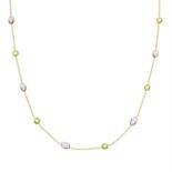 An 18ct gold purple and green paste necklace.