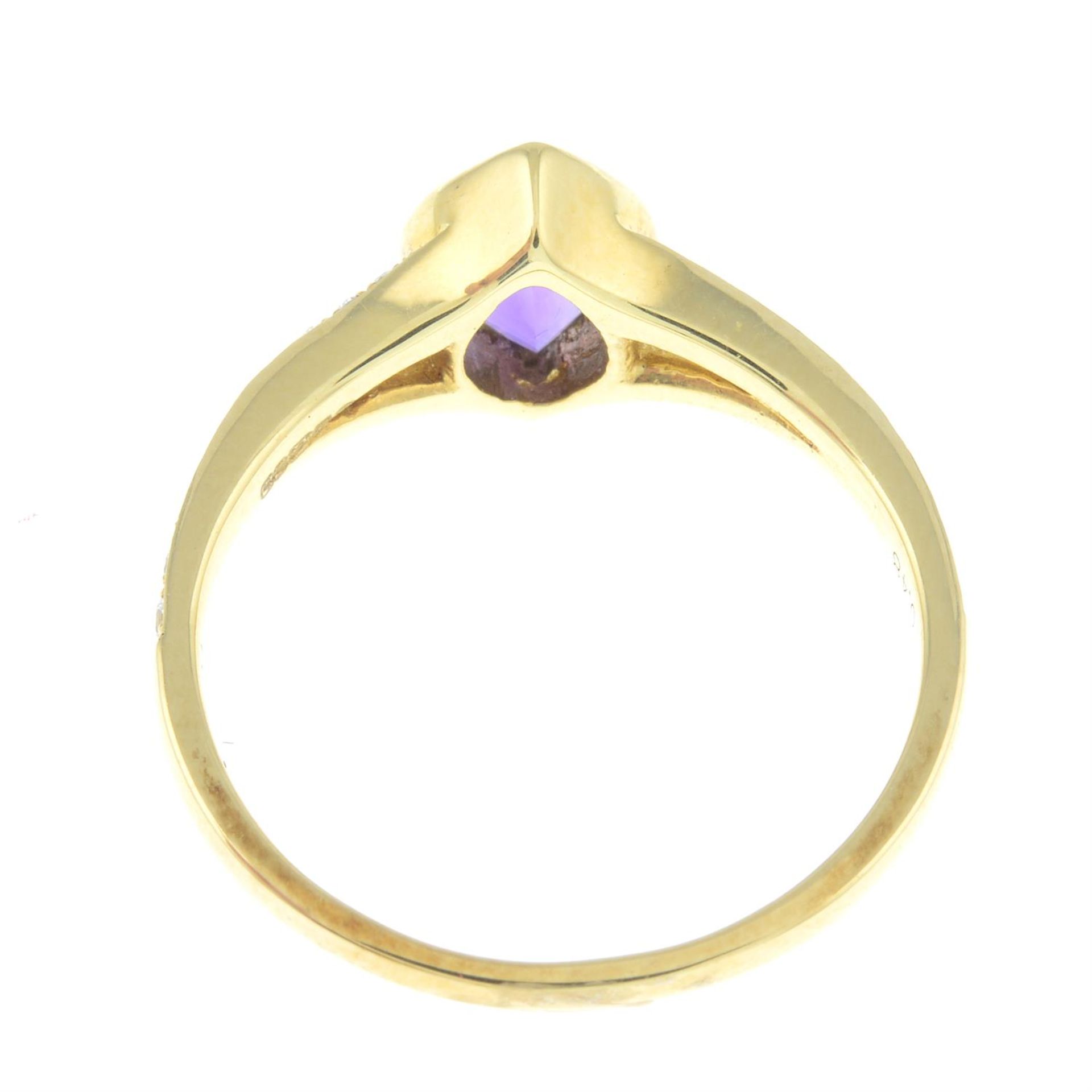 An 18ct gold amethyst dress ring, with diamond sides. - Image 2 of 2