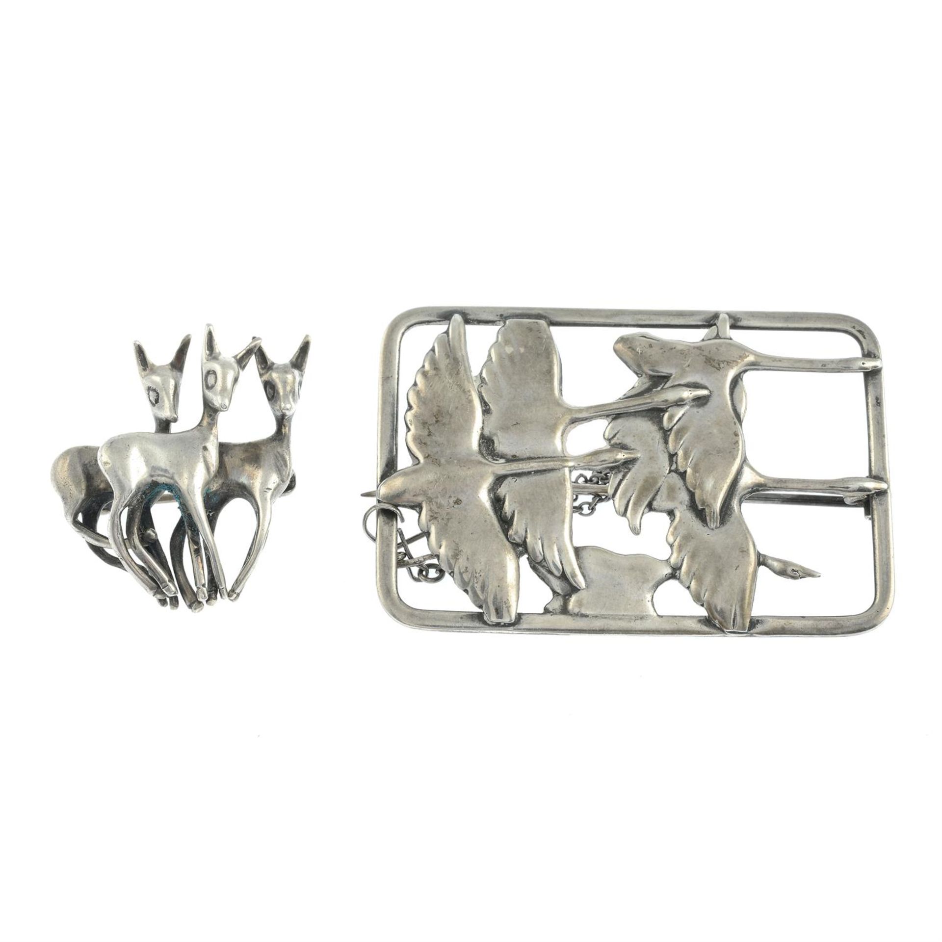 Two mid 20th century silver brooches.