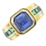 A sugarloaf cabochon sapphire and green garnet dress ring.