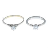 Two brilliant-cut diamond single-stone rings.