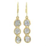 A pair of Polki diamond drop earrings.