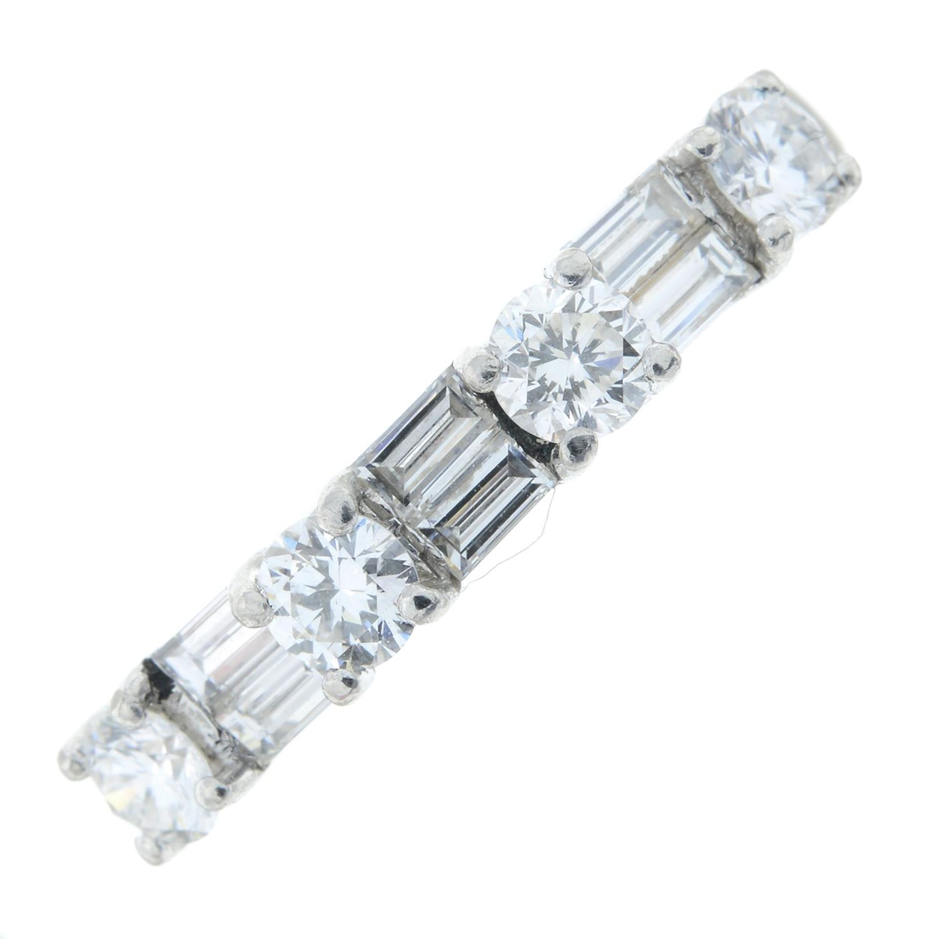 A vari-cut diamond half-eternity ring.