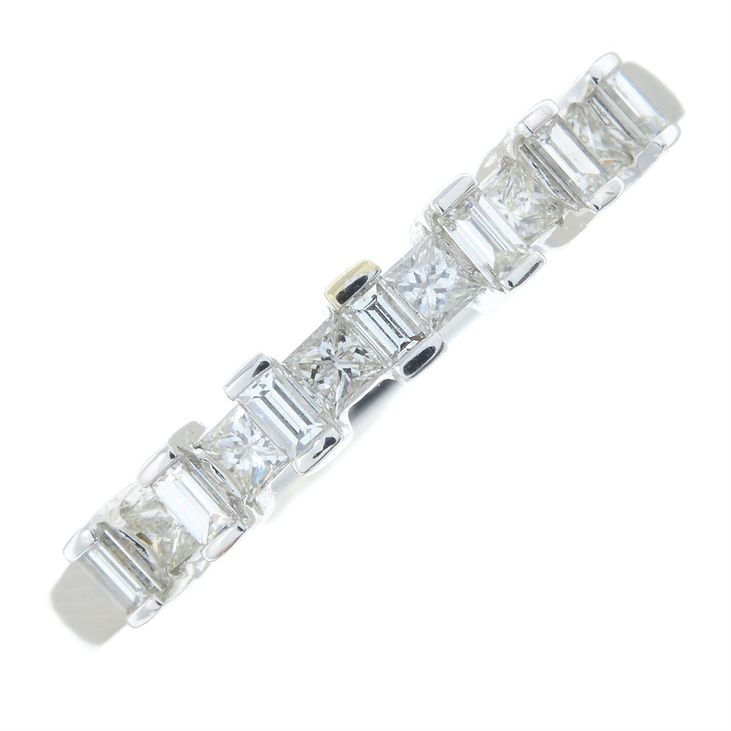 A square-shape and baguette-cut diamond half eternity ring.