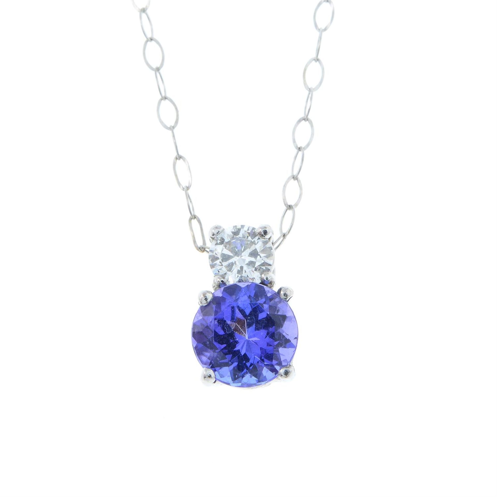 A tanzanite and brilliant-cut diamond pendant with chain.