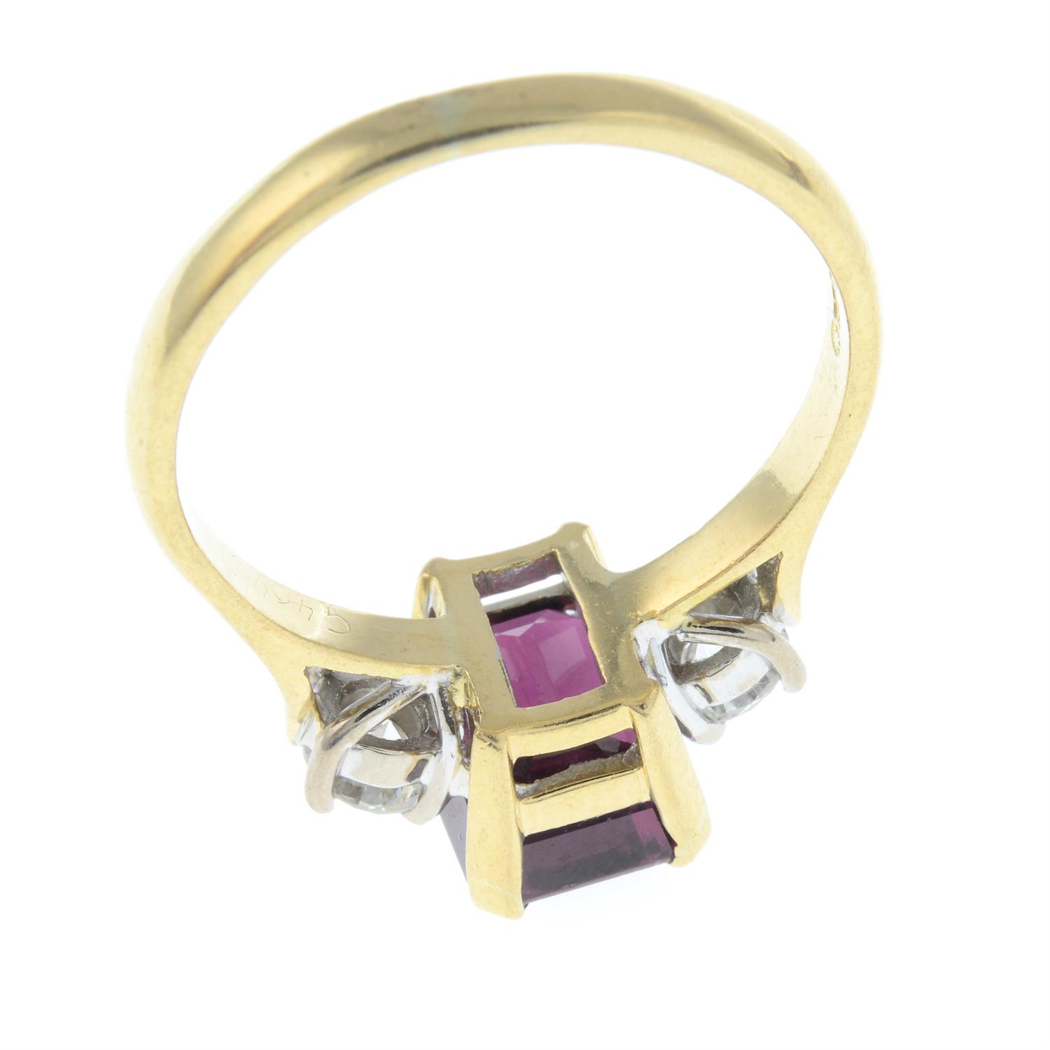 An 18ct gold garnet and brilliant-cut diamond three-stone ring. - Image 2 of 2