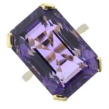 An amethyst single-stone cocktail ring.