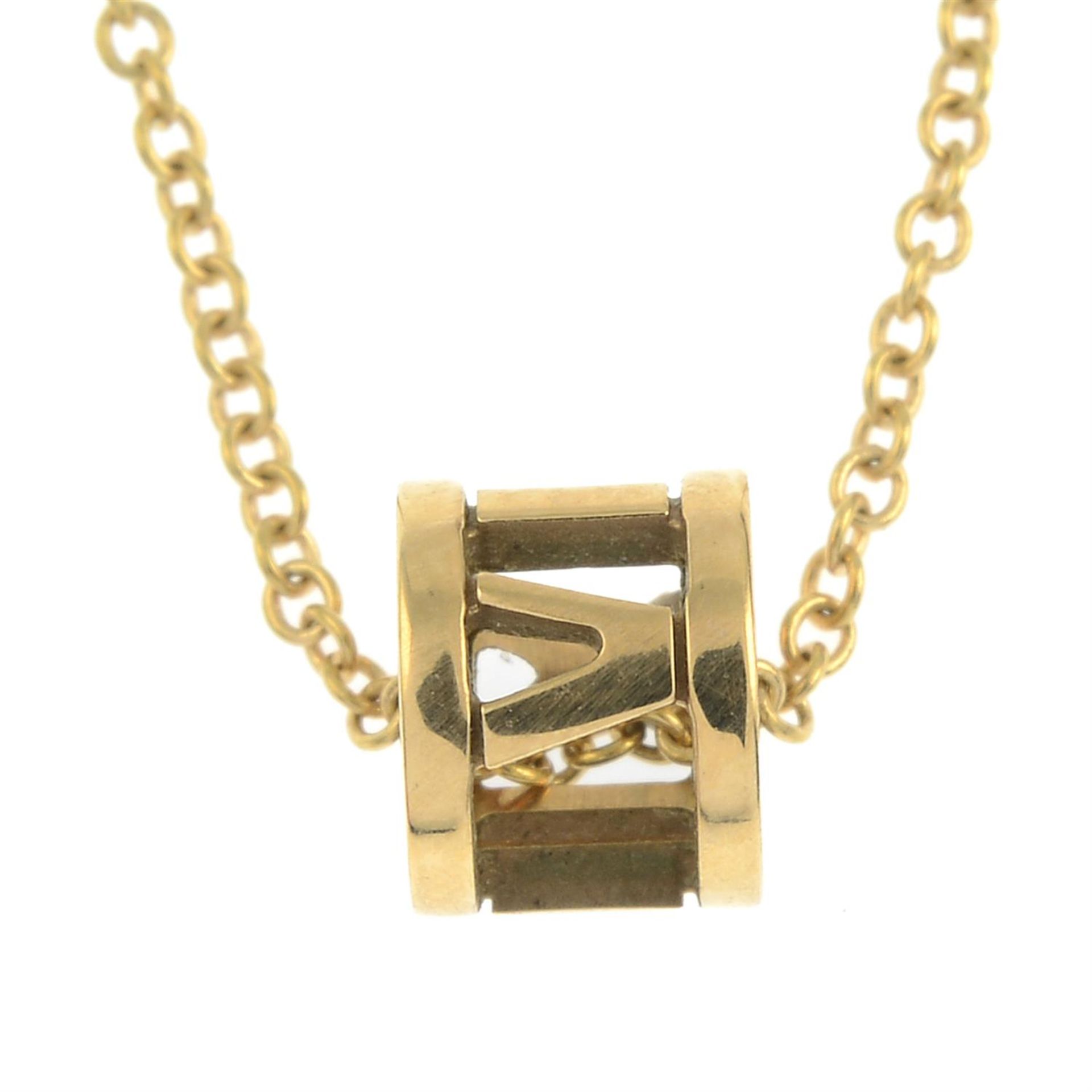 An 'Atlas X Open' pendant, with trace-link chain, by Tiffany & Co.