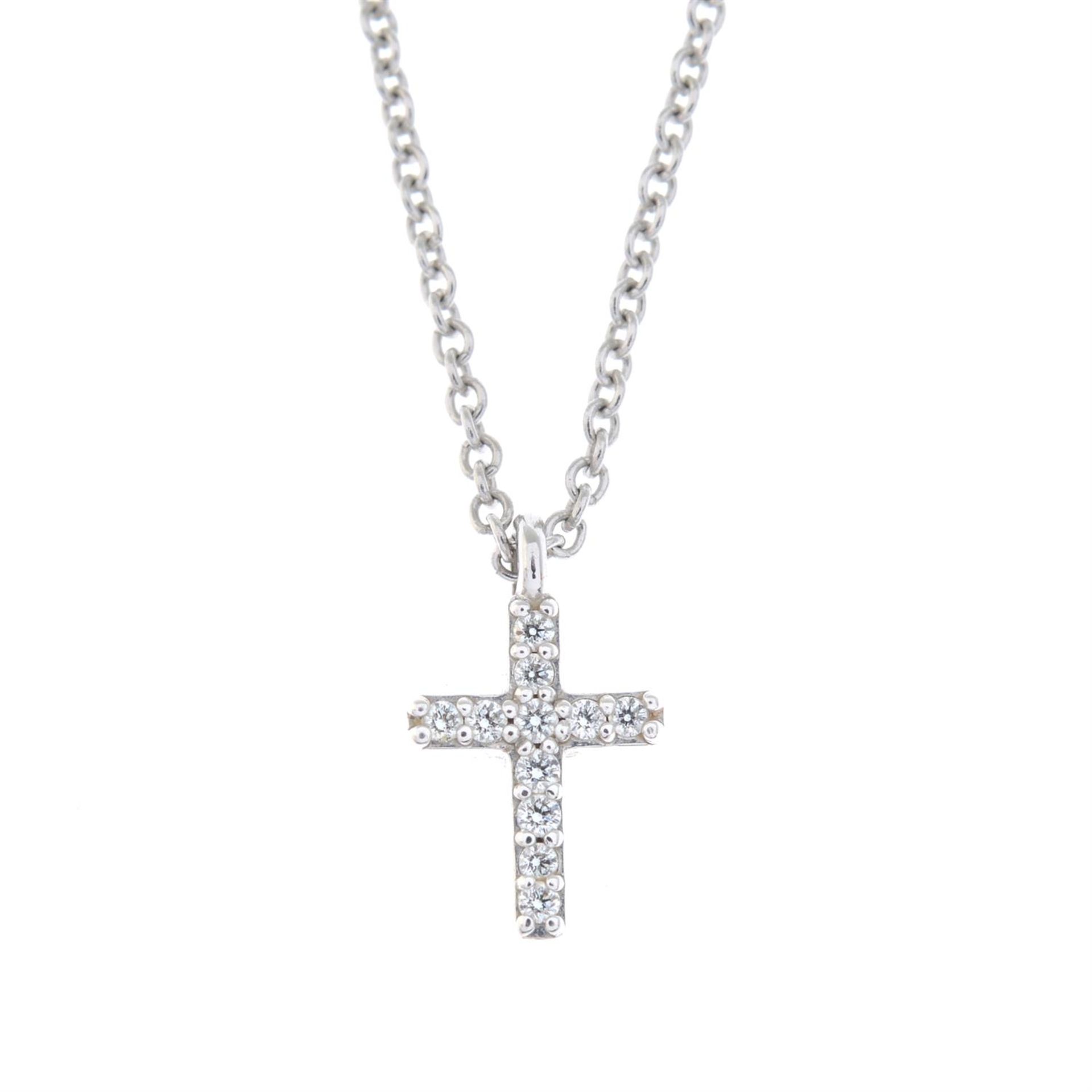 A diamond cross pendant, with chain, by Tiffany & Co.