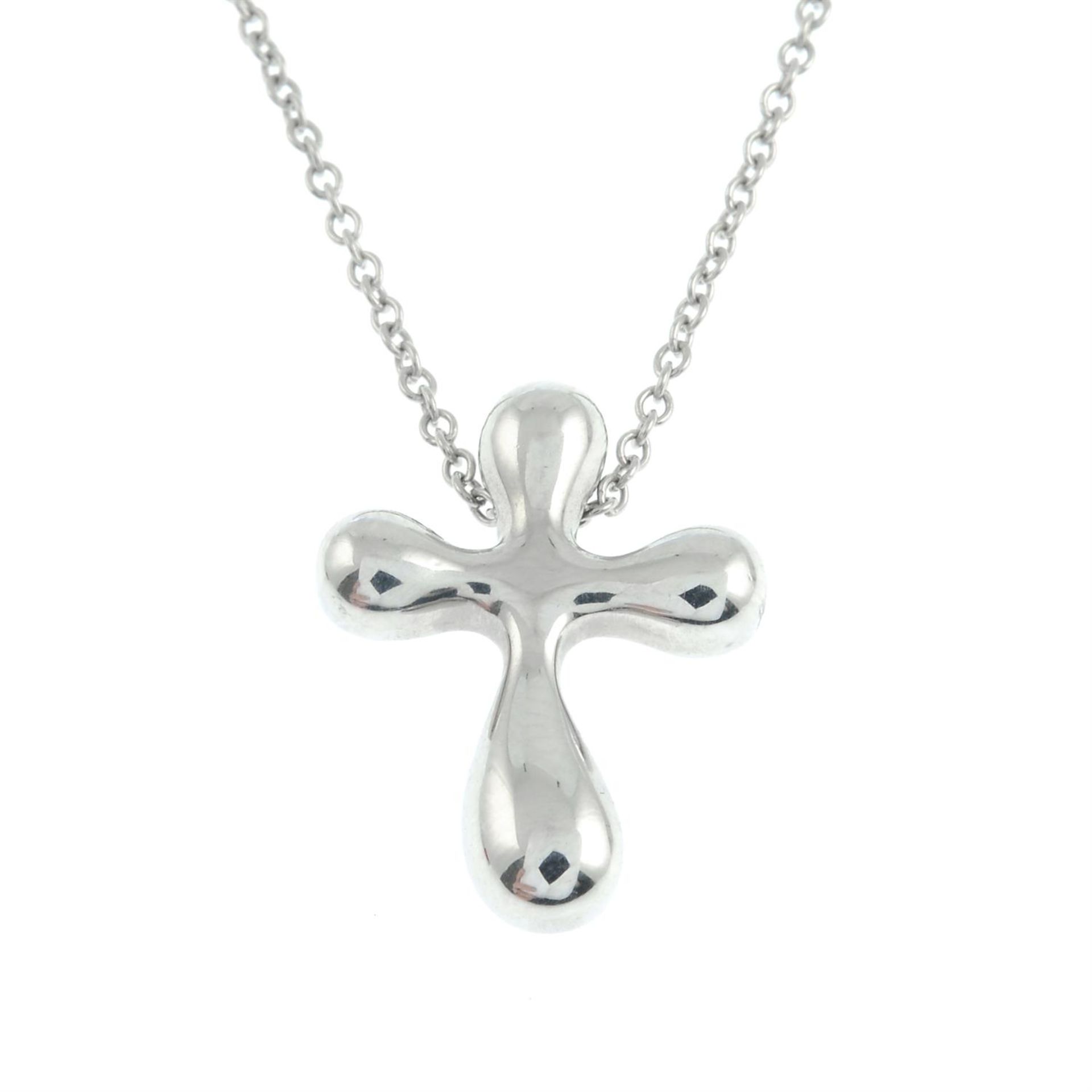A cross pendant, with chain, by Elsa Peretti for Tiffany & Co.