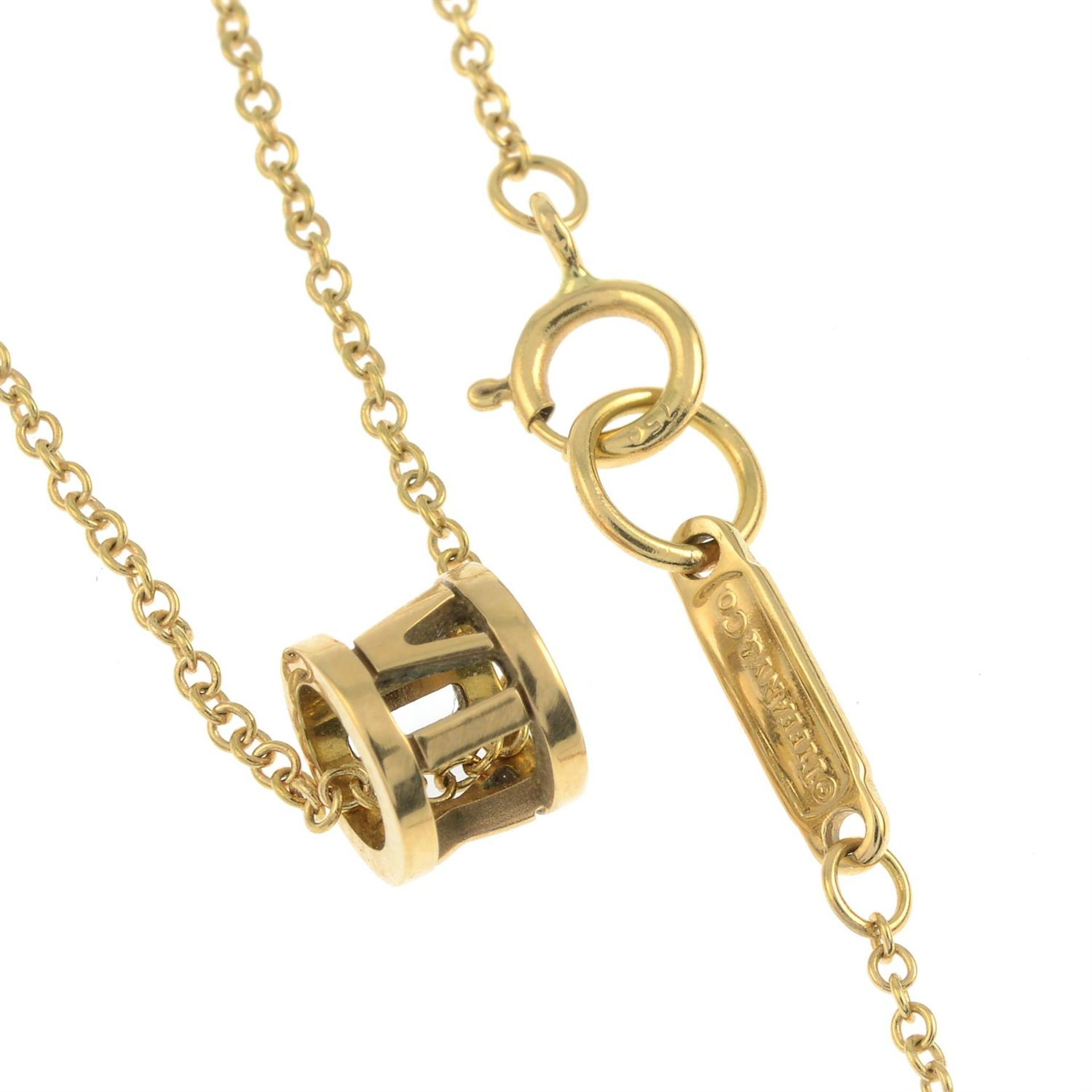 An 'Atlas X Open' pendant, with trace-link chain, by Tiffany & Co. - Image 2 of 3