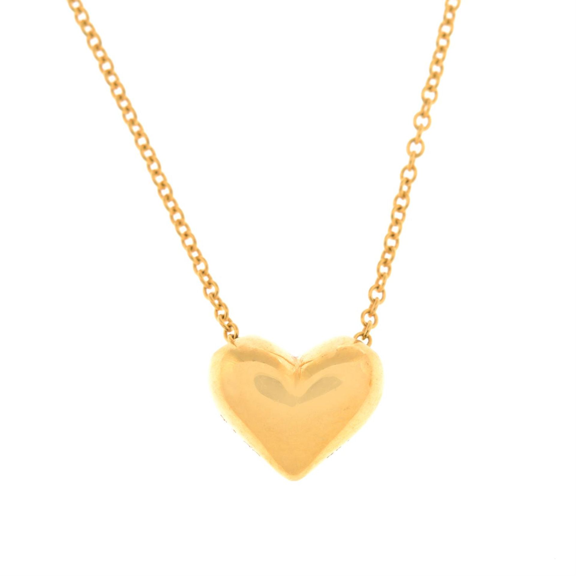 A heart pendant, with chain, by Tiffany & Co.