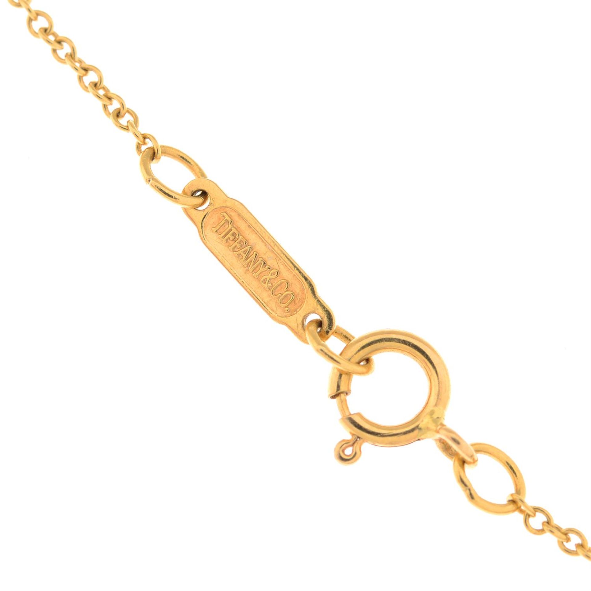 A brilliant-cut diamond heart pendant, on an integral trace-link chain, by Tiffany & Co. - Image 4 of 4