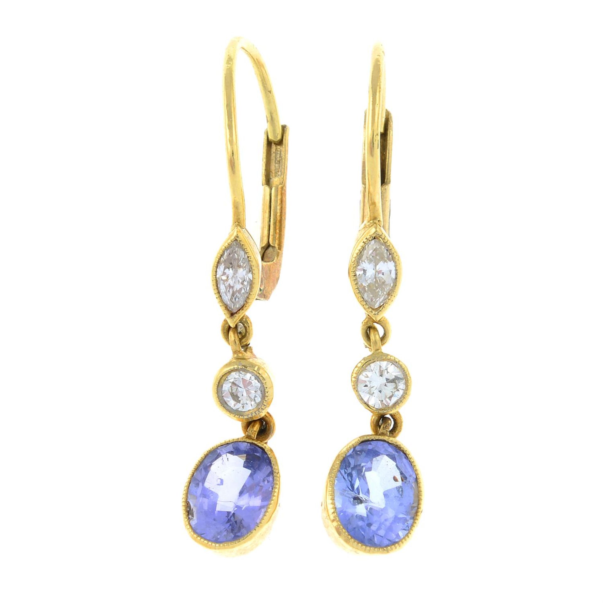 A pair of vari-cut diamond and sapphire drop earrings.