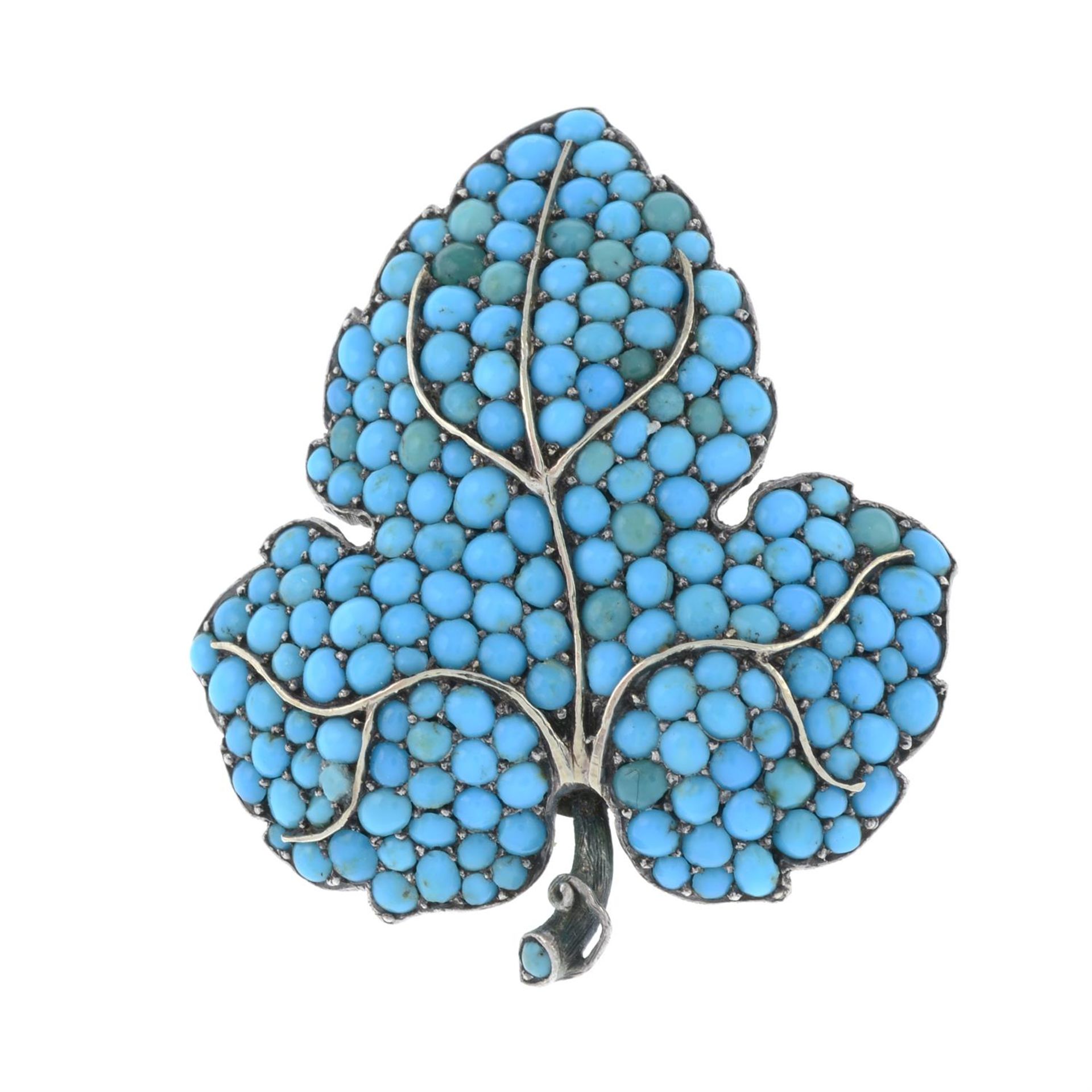 A turquoise foliate brooch.