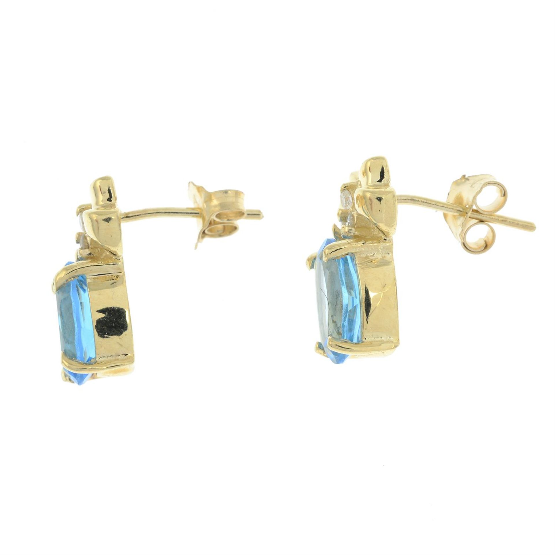 A pair of blue topaz and diamond earrings. - Image 2 of 2