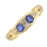 An Edwardian 18ct gold sapphire and diamond ring.