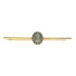 A cat's-eye chrysoberyl and split pearl bar brooch.