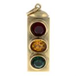 A 1970s 9ct gold vari-hue paste traffic light pendant.