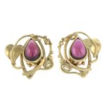 A pair of 9ct gold garnet earrings, with foliate detail.