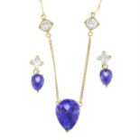 An 18ct gold tanzanite and diamond necklace and matching drop earring set together with two stone