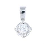 An 18ct gold illusion-set diamond single-stone pendant.