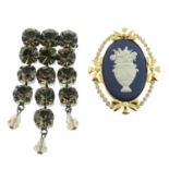 A Jasperware, paste and imitation pearl brooch, by Wedgwood, and a foiled-back paste fringe brooch,