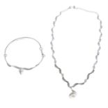 A silver cubic zirconia and cultured pearl jewellery set, to include a necklace and a bracelet.