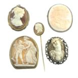 Four items of early 20th century and later shell cameo jewellery, all depicting classical figures.