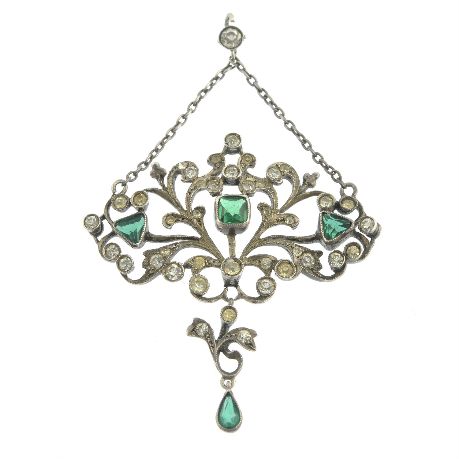 An early 20th century silver green and colourless paste drop pendant.