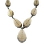 A graduated faceted smoky quartz bead necklace, by Stephen Dweck.