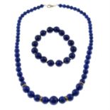 A 9ct gold graduated lapis lazuli bead necklace, together with a bracelet.