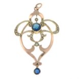 An early 20th century 9ct gold blue paste and seed pearl pendant.