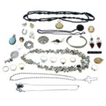A selection of silver, white metal and costume jewellery.