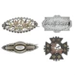 Four late 19th century silver brooches.