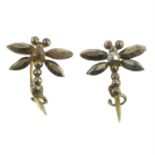 A pair of dragonfly earrings.