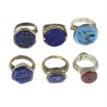 Six gem-set intaglio signet rings.