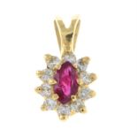 A synthetic ruby and cubic zirconia cluster pendant.