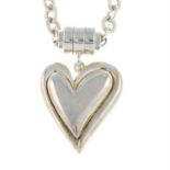 A magnetic chain-link necklace, with heart pendant, by Joseph Esposito.