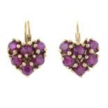 A pair of ruby heart-shape cluster earrings.