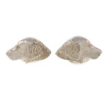 A pair of silver dog head cufflinks, by Deakin and Francis.