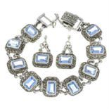 A silver blue topaz and marcasite bracelet, together with a pair of matching earrings.