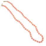 An early 20th century graduated coral bead necklace.