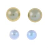 Two pairs of vari-hue cultured pearl single-stone earrings.