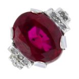 A synthetic ruby, colourless gem and diamond ring.