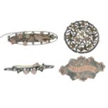 Four late Victorian silver brooches, including a floral bar brooch by Payton, Pepper & Co.