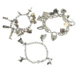 One silver charm bracelet together with two further charms bracelets, with a variety of charms.